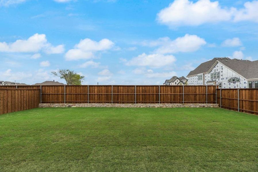 Exterior details and patio area of a home in Grand Estates of Anna, Anna (Image 3).