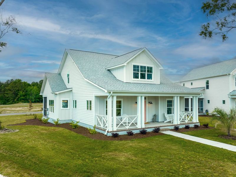 Representative exterior photo of a completed home built from the Hanover by Bill Clark Homes in Osprey Landing, Southport, NC (Image 22).