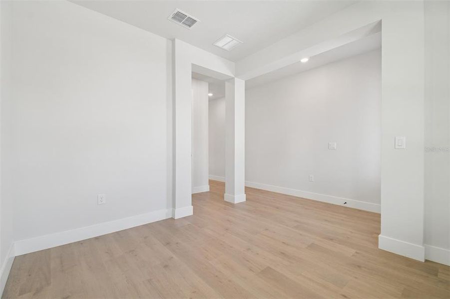 Spacious, unfurnished interior of a new home in Waterset Tradition Series, Apollo Beach (Image 18).