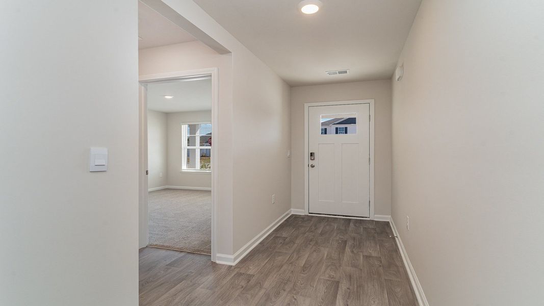 Spacious, unfurnished interior of a new home in The Bluffs at Mill Creek, Florence (Image 8).