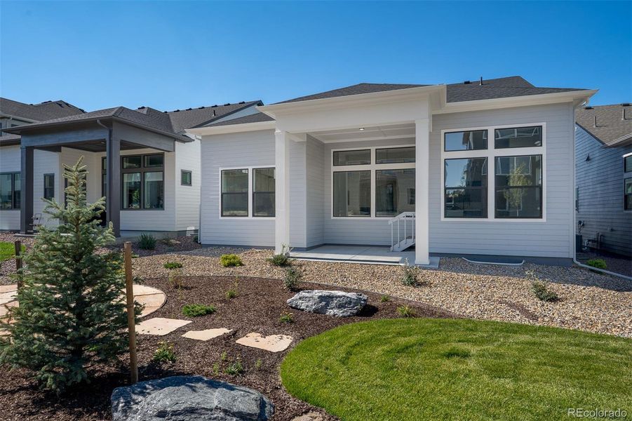 Front exterior of a new home in Cloverleaf – Mountainview Collection, Monument, CO, highlighting curb appeal (Image 1).