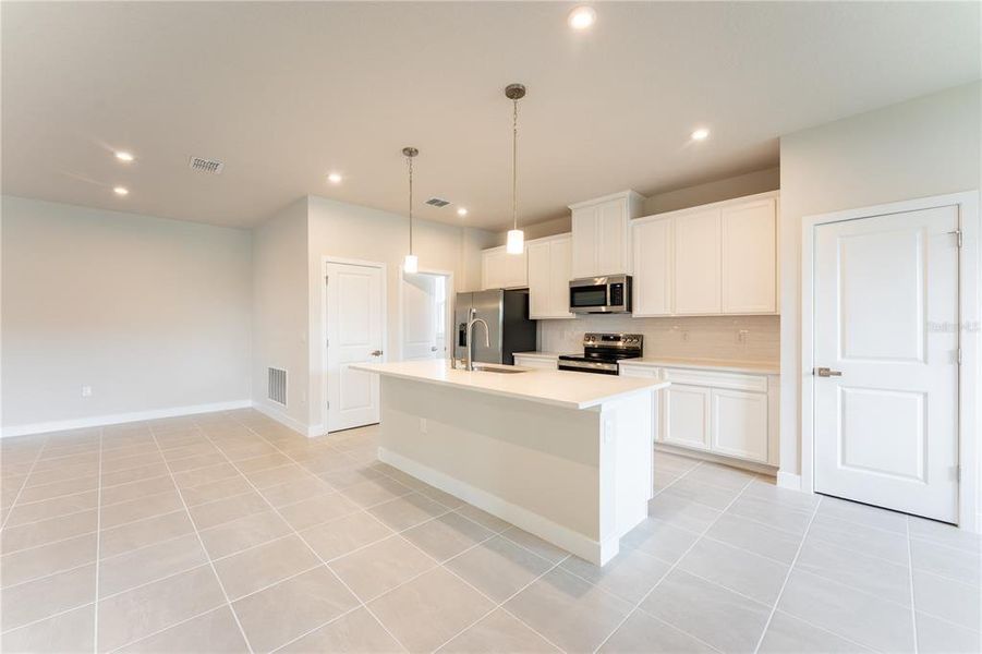 Furnished interior view inside a new home in The Palms at Venetian Bay, New Smyrna Beach (Image 4).