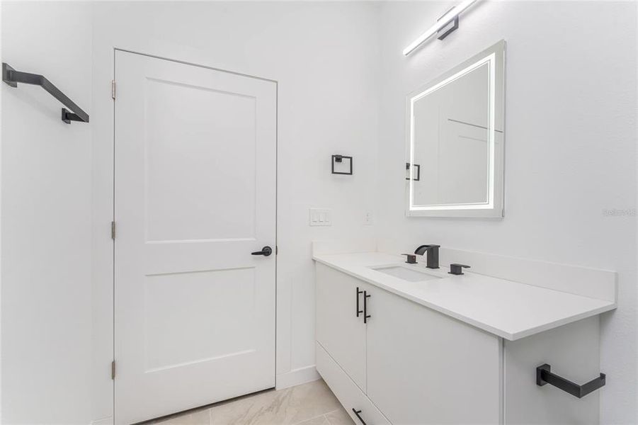 Furnished interior view inside a new home in , Port Charlotte (Image 15).