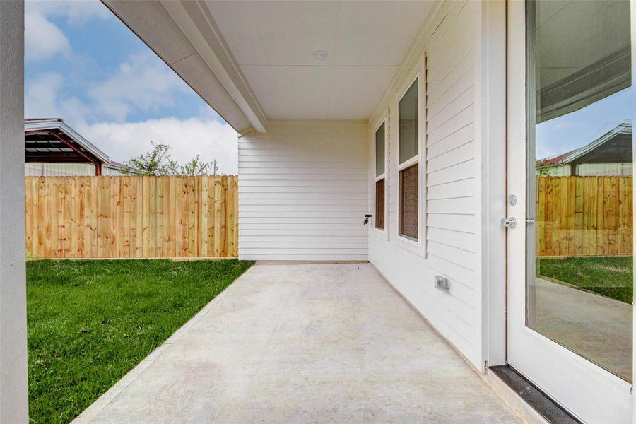 Exterior details and patio area of a home in , Houston (Image 21). Exterior details and patio area of a home in , Houston (Image 21).