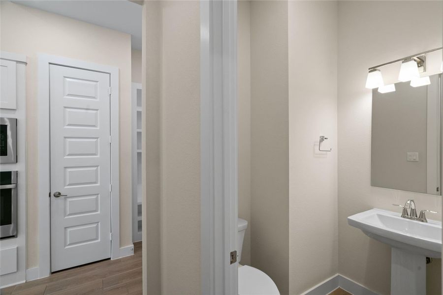 Half bath near the laundry room.