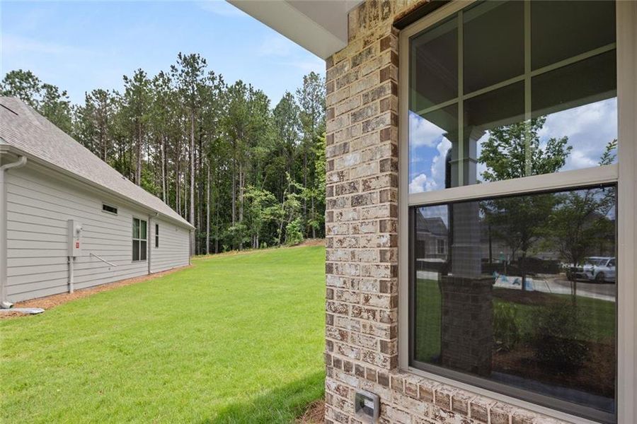 Exterior details and patio area of a home in Soleil Belmont Park, Canton (Image 28). Exterior details and patio area of a home in Soleil Belmont Park, Canton (Image 28).