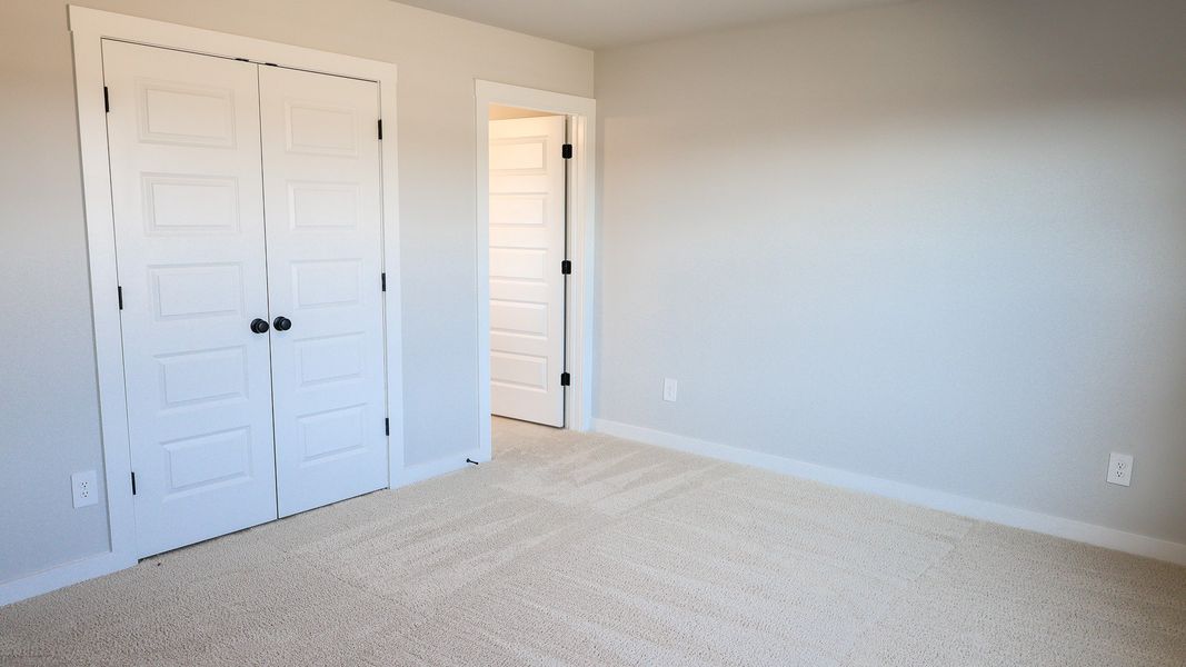 Representative unfurnished interior of a home built from the STONEBROOK II by D.R. Horton in Harvest Point, Spring Hill (Image 58).