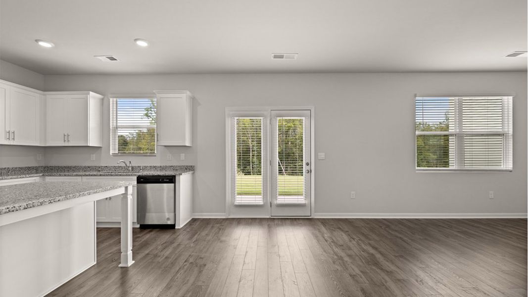 Representative furnished interior of a home built from the Mansfield by D.R. Horton in Highland Hills, Graniteville (Image 6).