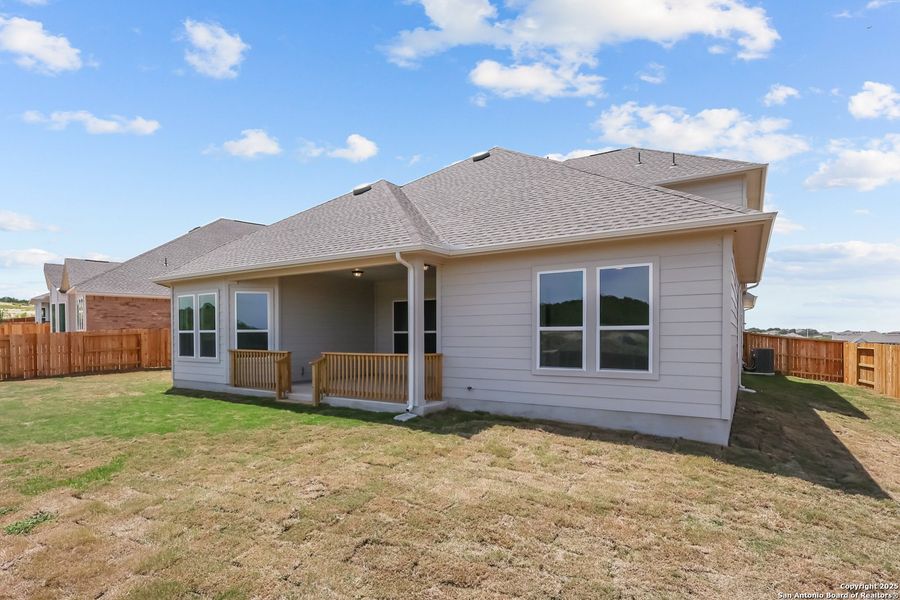 Front exterior of a new home in Homestead, Schertz, TX, highlighting curb appeal (Image 19).