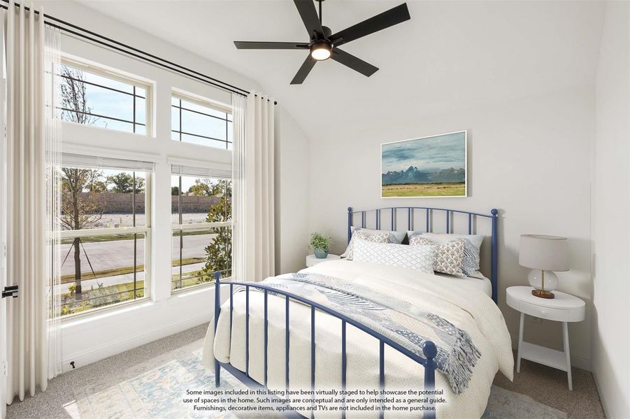 Bedroom with blue metal bed frame, ceiling fan, and large windows with white curtains Bedroom with blue metal bed frame, ceiling fan, and large windows with white curtains
