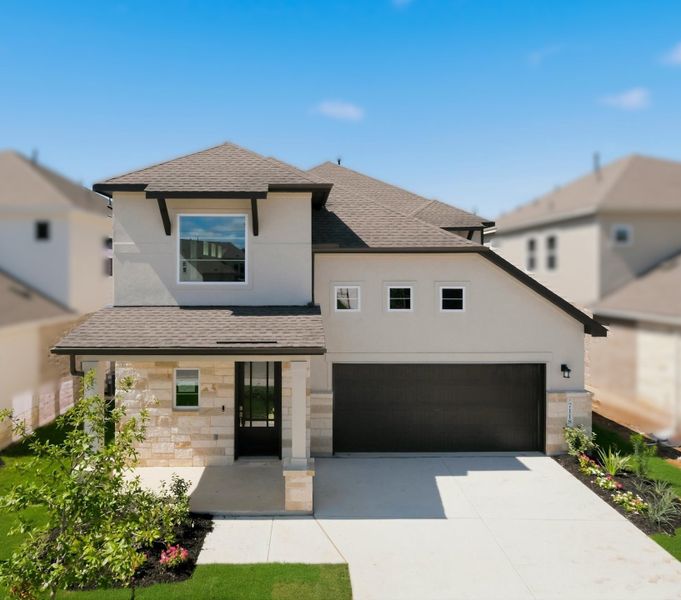 Representative exterior photo of a completed home built from the Travis by Scott Felder Homes in Santa Rita Ranch, Liberty Hill, TX (Image 12).