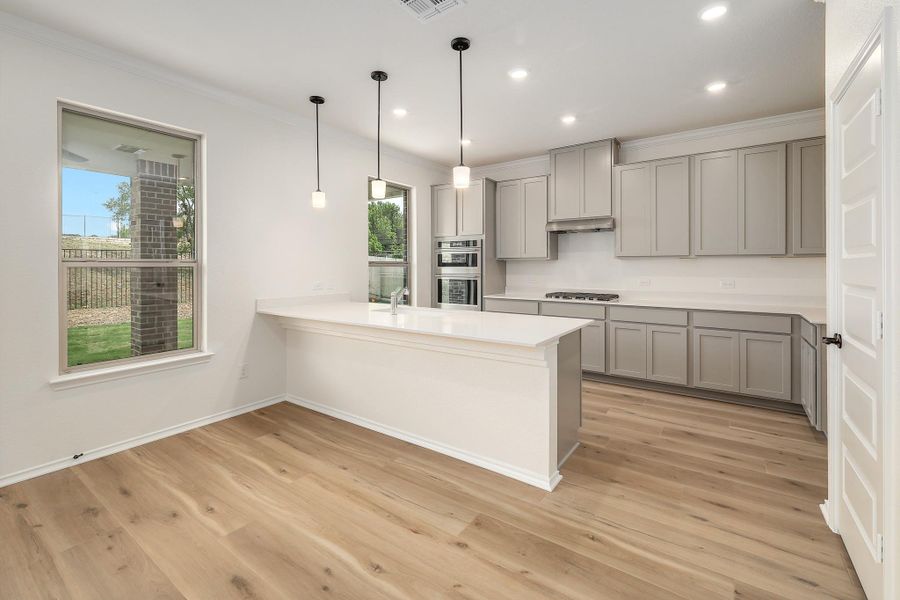 Furnished interior view inside a new home in River Bluff, Leander (Image 10).