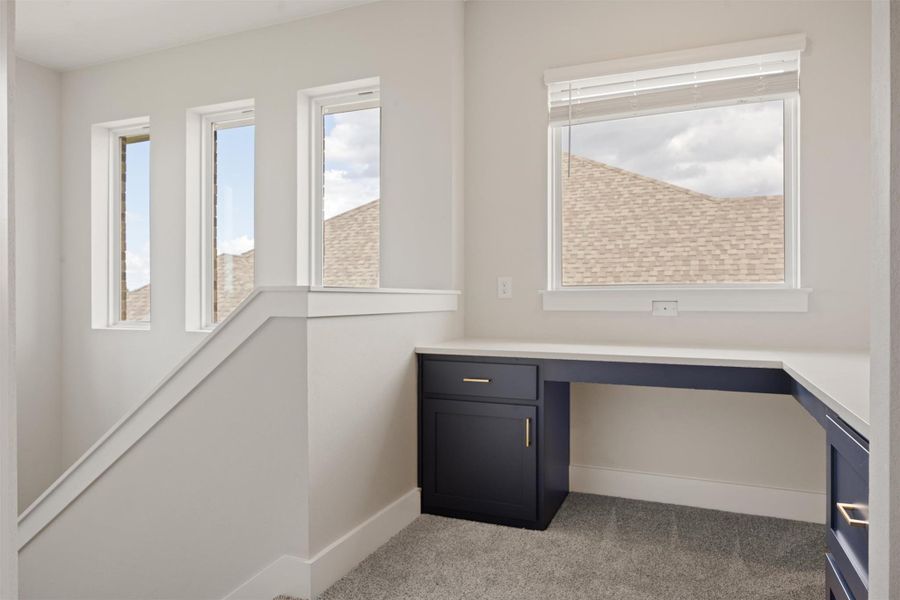 Built-in desk area at second level Built-in desk area at second level