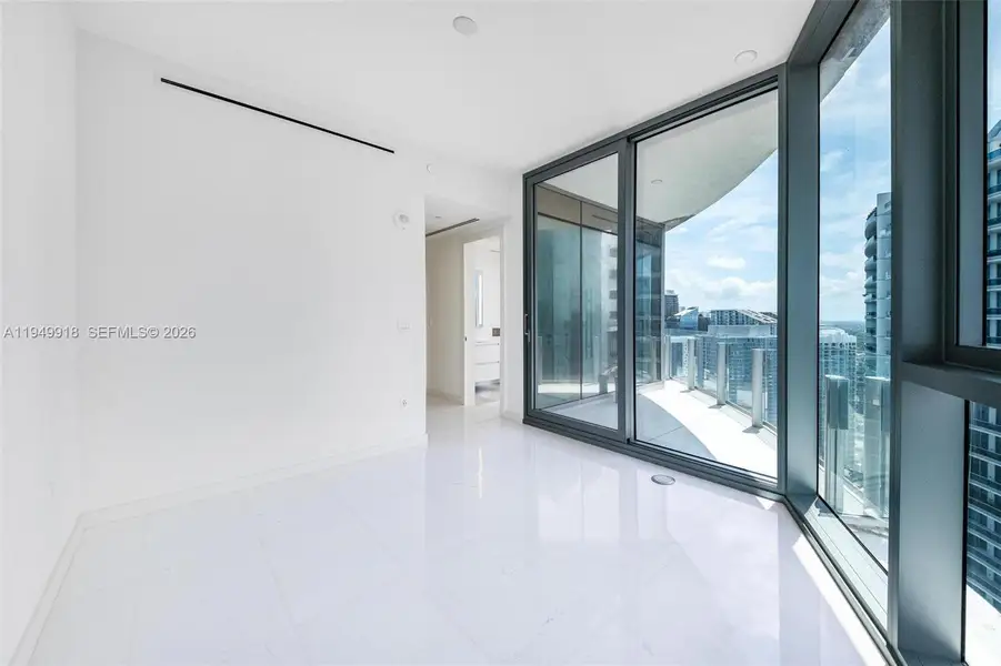 Spacious, unfurnished interior of a new home in Aston Martin Residences, Miami (Image 48).