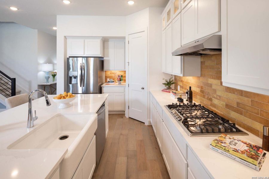 Furnished interior view inside a new home in Weston Oaks, San Antonio (Image 9).