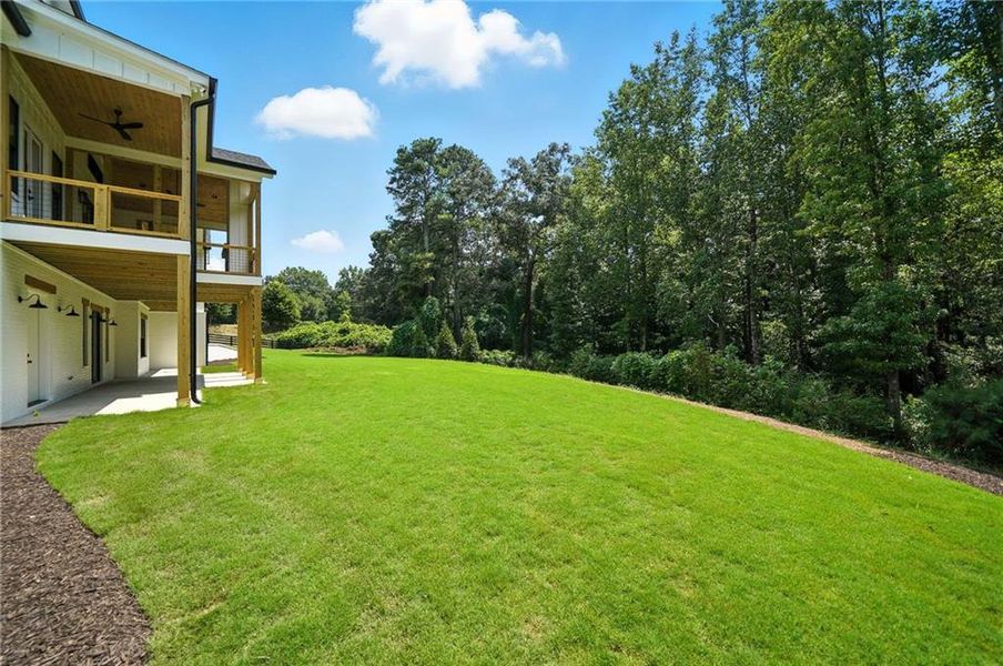 Front exterior of a new home in , Canton, GA, highlighting curb appeal (Image 26).