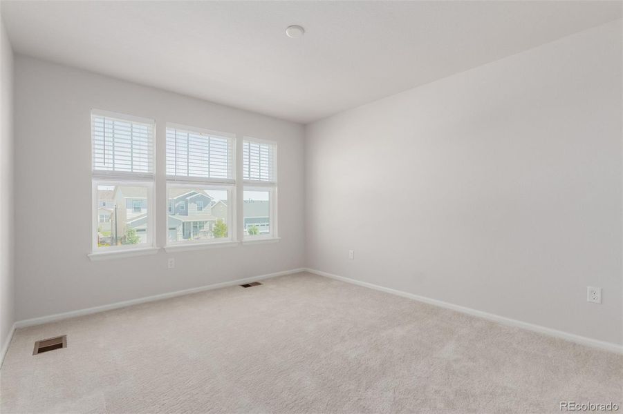 Spacious, unfurnished interior of a new home in The Aurora Highlands, Aurora (Image 21).