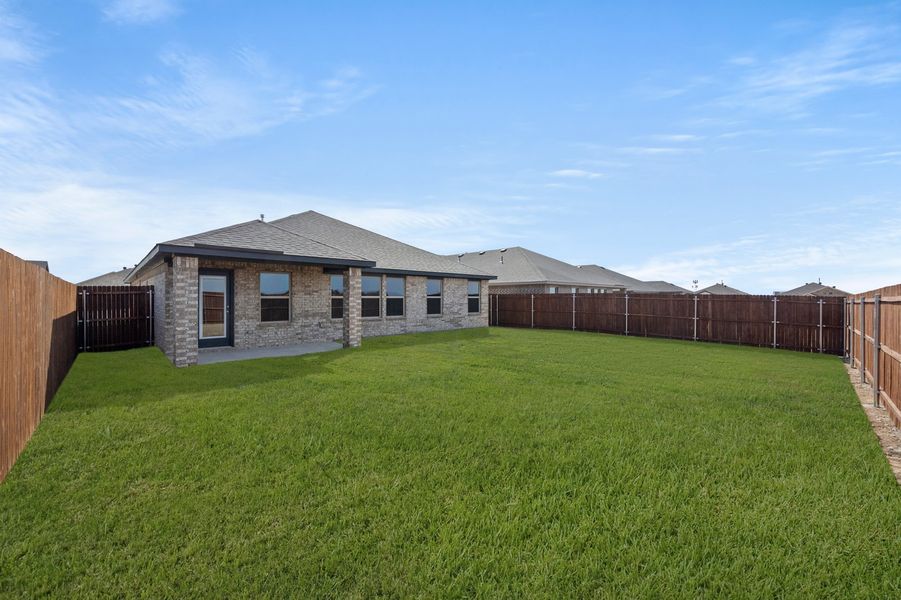 Front exterior of a new home in Baker Farms, Cleburne, TX, highlighting curb appeal (Image 26).