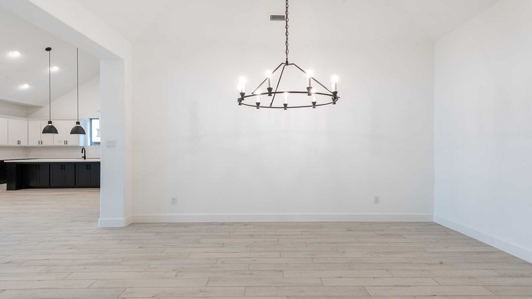 Representative unfurnished interior of a home built from the 3566W by Perry Homes in Sonoma Verde 70', Rockwall (Image 14).