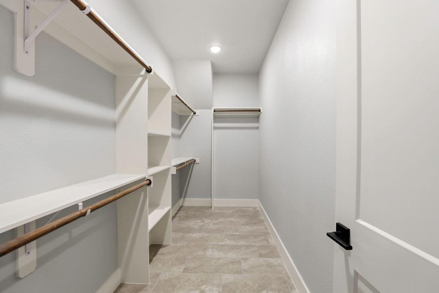 Ample shelving and hanging space in this well-appointed closet ensures organized storage. Ample shelving and hanging space in this well-appointed closet ensures organized storage.