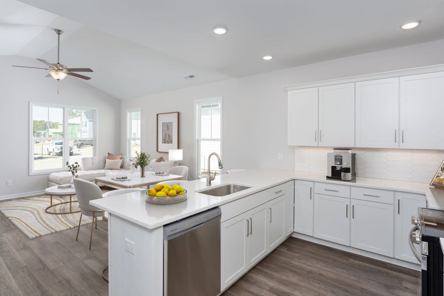 Representative furnished interior of a home built from the Palm by Stevens Fine Homes in River Hills, Shallotte (Image 9).
