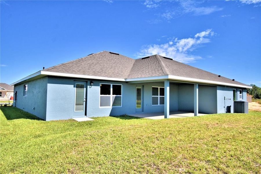 Exterior details and patio area of a home in Cadence Crossing, Auburndale (Image 3). Exterior details and patio area of a home in Cadence Crossing, Auburndale (Image 3).