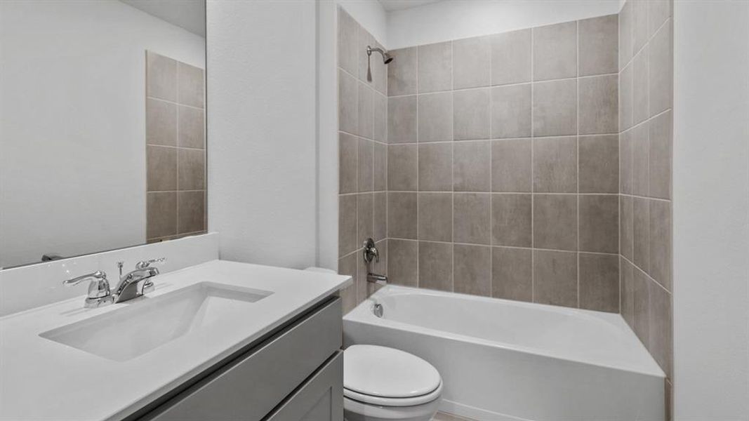 Full bathroom with vanity and tub / shower combination