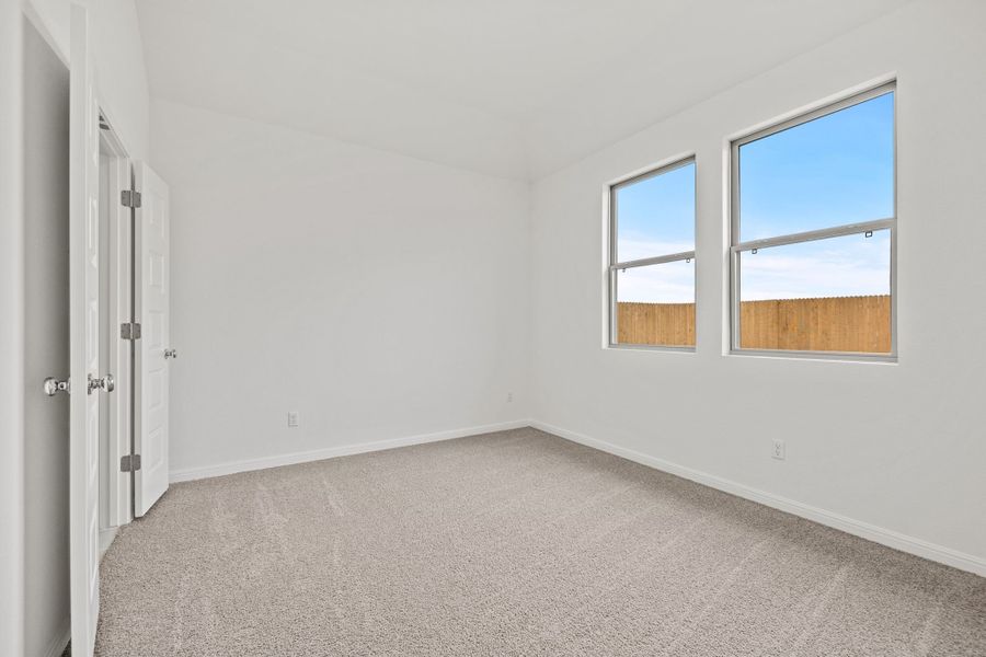 Primary Suite in the Birch home plan by Trophy Signature Homes – REPRESENTATIVE PHOTO