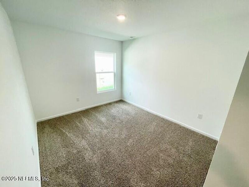 Spacious, unfurnished interior of a new home in Grand Reserve, Bunnell (Image 52).