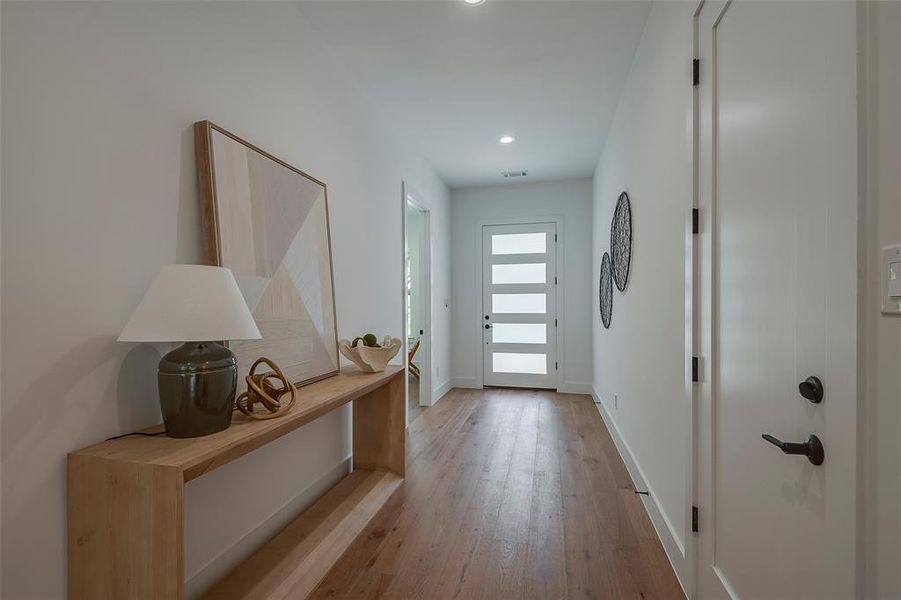 Doorway featuring hardwood / wood-style flooring