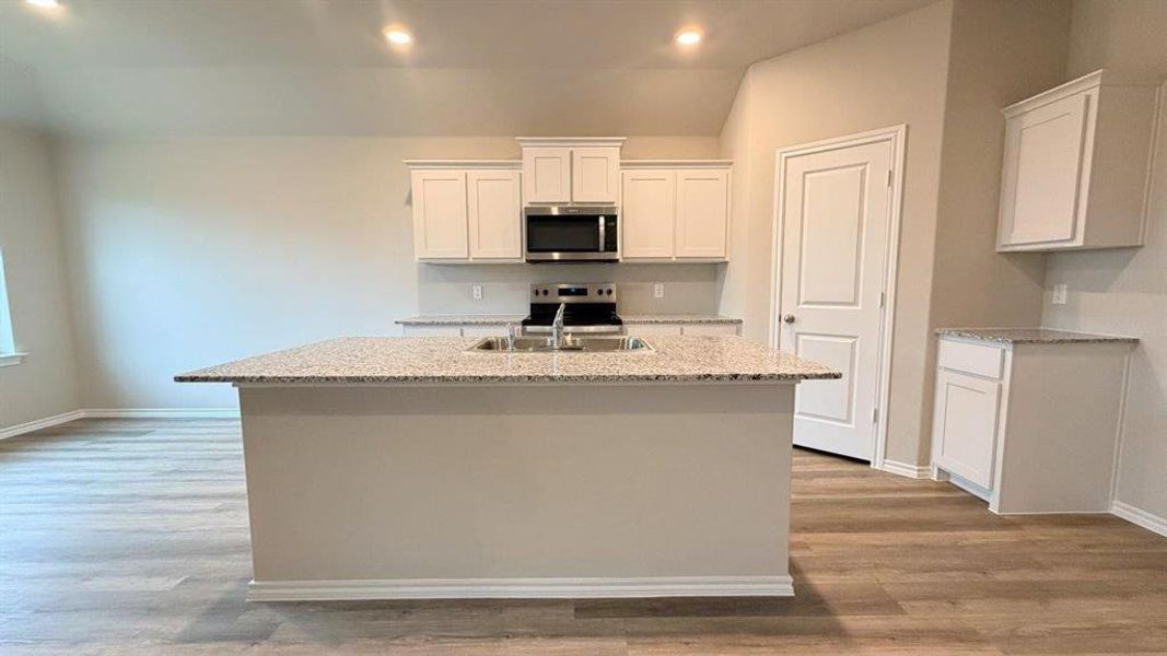 Kitchen - All Home and community information, including pricing, included features, terms, availability and amenities, are subject to change at any time without notice or obligation. All Drawings, pictures, photographs, video, square footages, floor plans, elevations, features, colors and sizes are approximate for illustration purposes only and will vary from the homes as built.