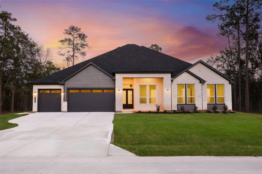 Front exterior of a new home in , Pinehurst, TX, highlighting curb appeal (Image 22). Front exterior of a new home in , Pinehurst, TX, highlighting curb appeal (Image 22).