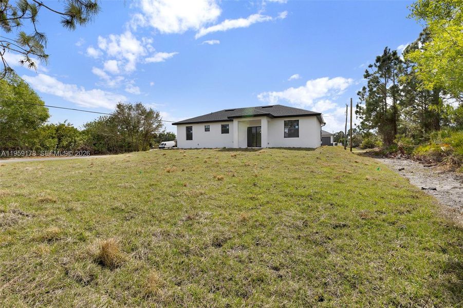 Exterior details and patio area of a home in , Lehigh Acres (Image 3).