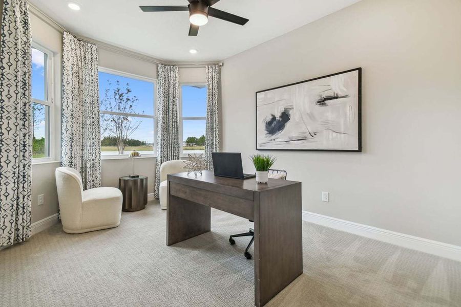 Representative furnished interior of a home built from the Sweetwater 3-Car by William Ryan Homes in Pinecone Reserve, Brooksville (Image 13).