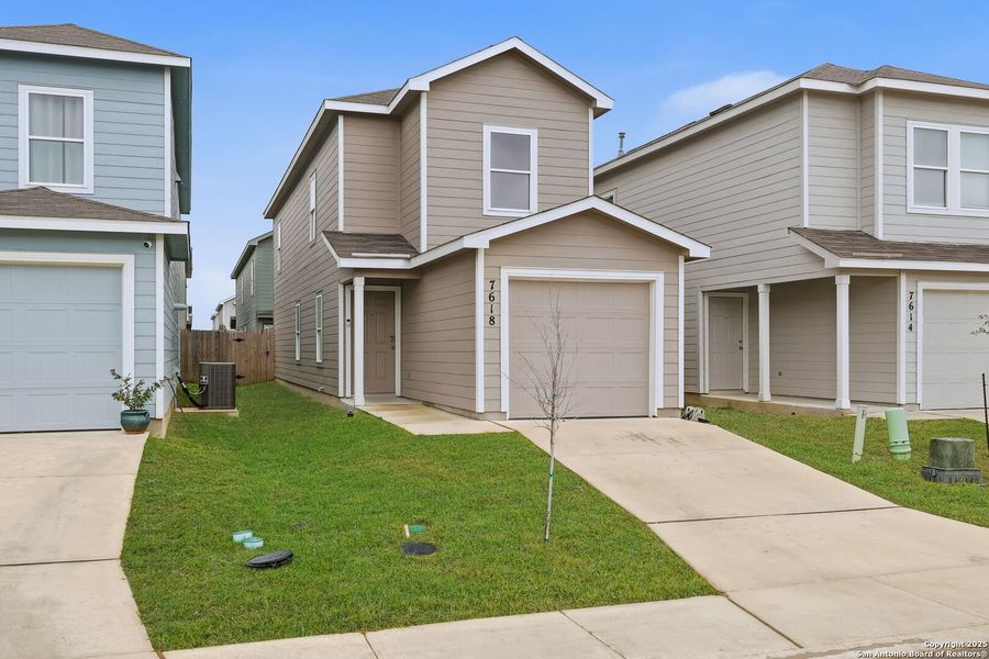 Front exterior of a new home in Aston Park: Wellton Collection, San Antonio, TX, highlighting curb appeal (Image 1).