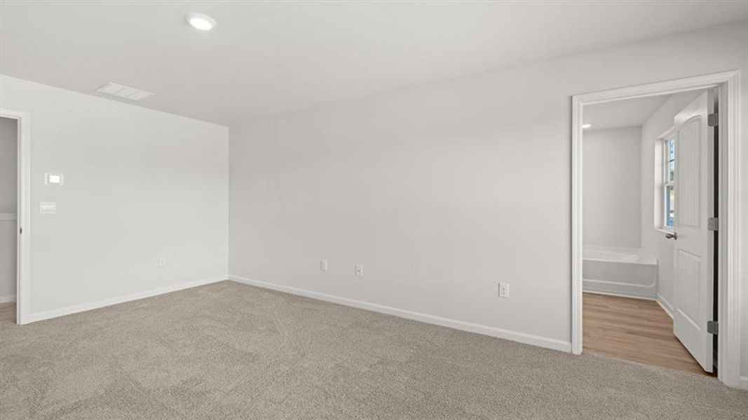 Spacious, unfurnished interior of a new home in Waypoint, Flowery Branch (Image 29).