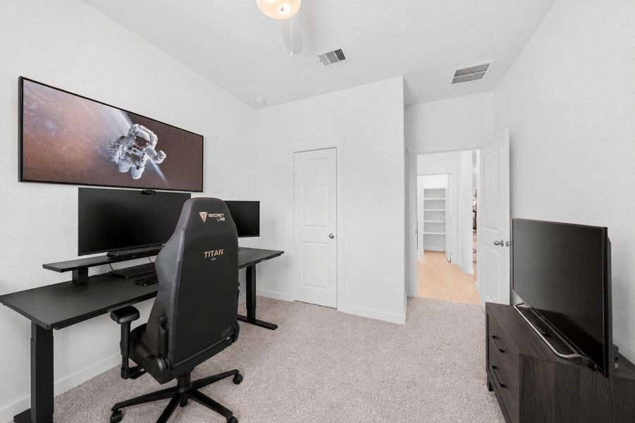 Ideal for remote work or study, this adaptable space easily supports a large desk and additional media or lounge elements.
