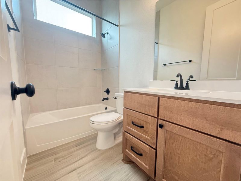 Furnished interior view inside a new home in Wood Leaf Reserve, Tomball (Image 7).