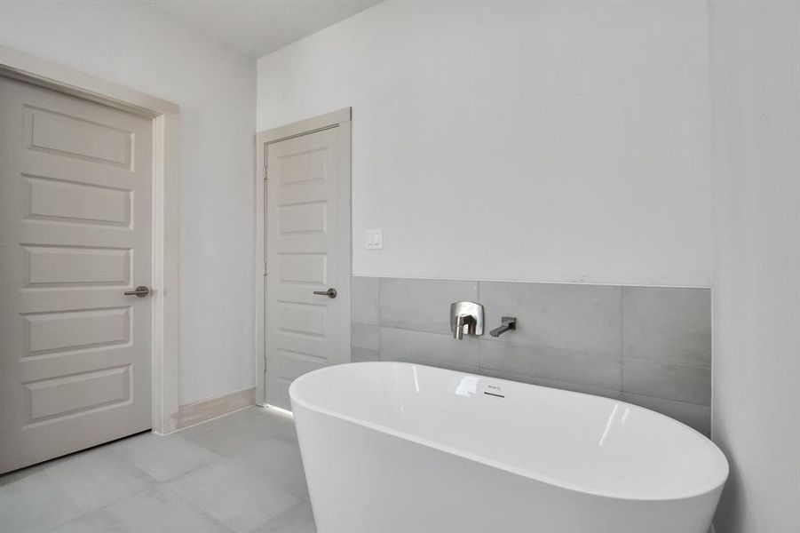 Primary Bedroom Bathroom with Spacious Walk-in Shower and Freestanding Tub