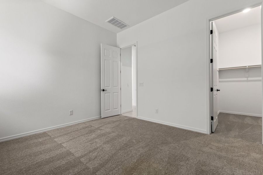 Spacious, unfurnished interior of a new home in Empire Pointe, Queen Creek (Image 13).