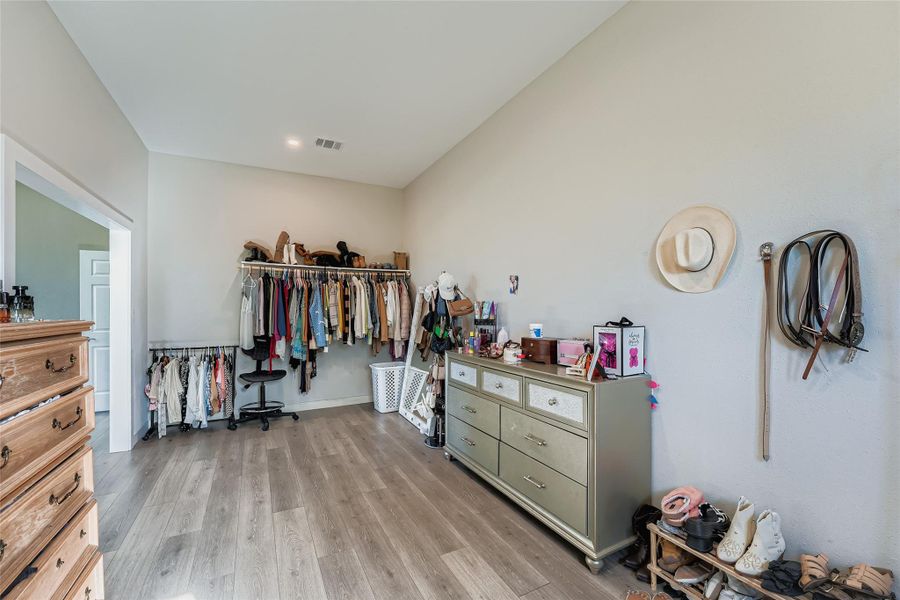 Bedroom featuring light wood-style floors Bedroom featuring light wood-style floors