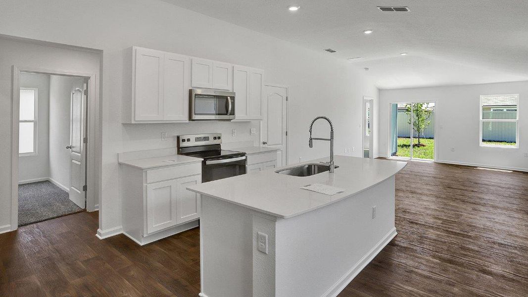 Representative furnished interior of a home built from the Adele+ by D.R. Horton in Liberty Cove, Yulee (Image 4).
