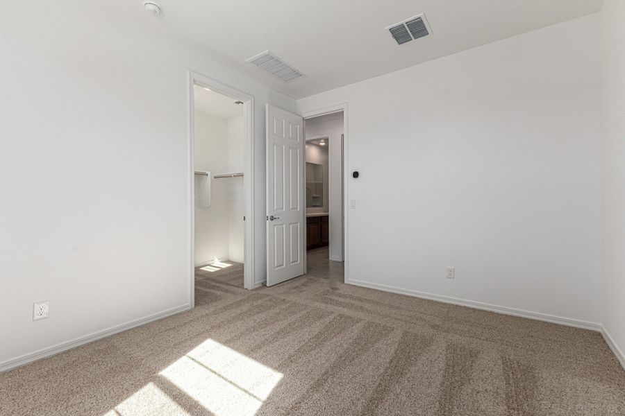 Spacious, unfurnished interior of a new home in Empire Pointe, Queen Creek (Image 13).