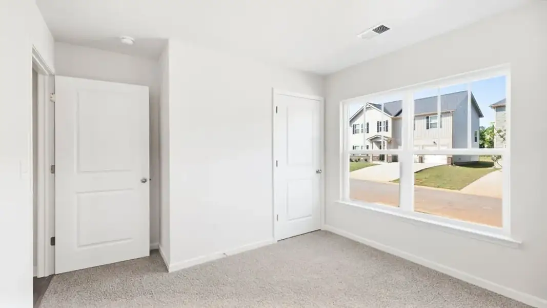 Spacious, unfurnished interior of a new home in Reedy Fork Place, Seneca (Image 20).