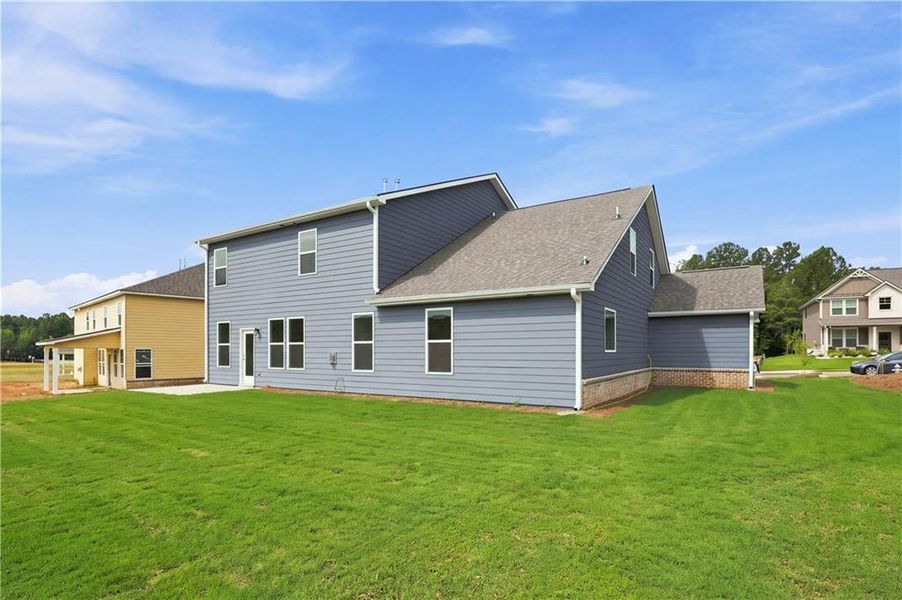 Exterior details and patio area of a home in Kingston, Locust Grove (Image 16).