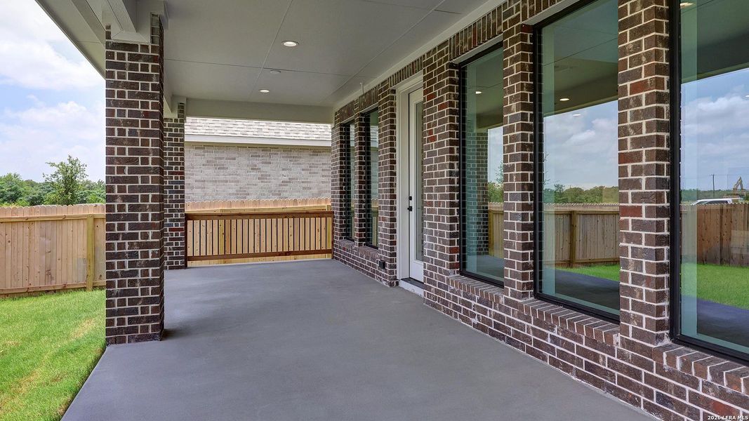 Exterior details and patio area of a home in Kallison Ranch, San Antonio (Image 21).