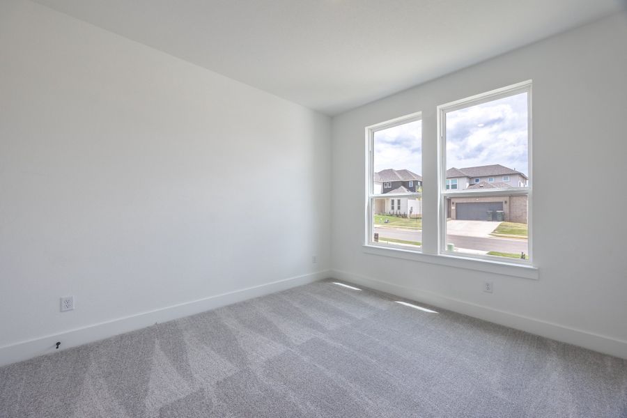 Spacious, unfurnished interior of a new home in Sage Collection – Freedom at Anthem, Kyle (Image 10).