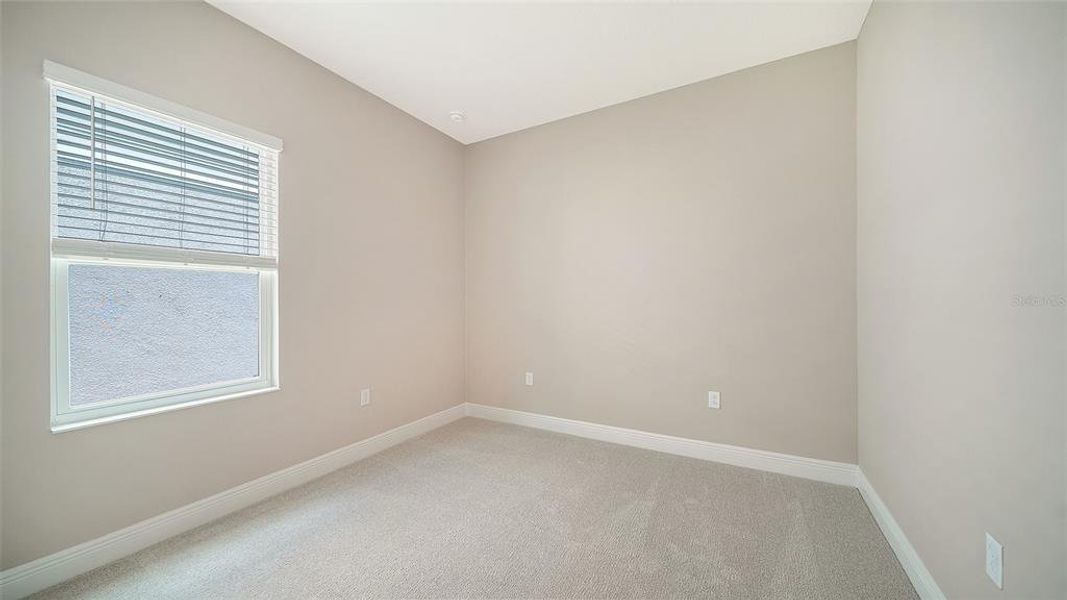 Spacious, unfurnished interior of a new home in Wildleaf at North River Ranch, Parrish (Image 23).