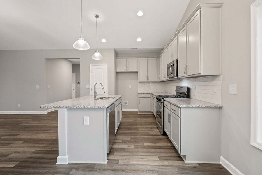 Representative furnished interior of a home built from the Garland by Caviness & Cates Communities in Bartlett Manor, Youngsville (Image 183). Representative furnished interior of a home built from the Garland by Caviness & Cates Communities in Bartlett Manor, Youngsville (Image 183).
