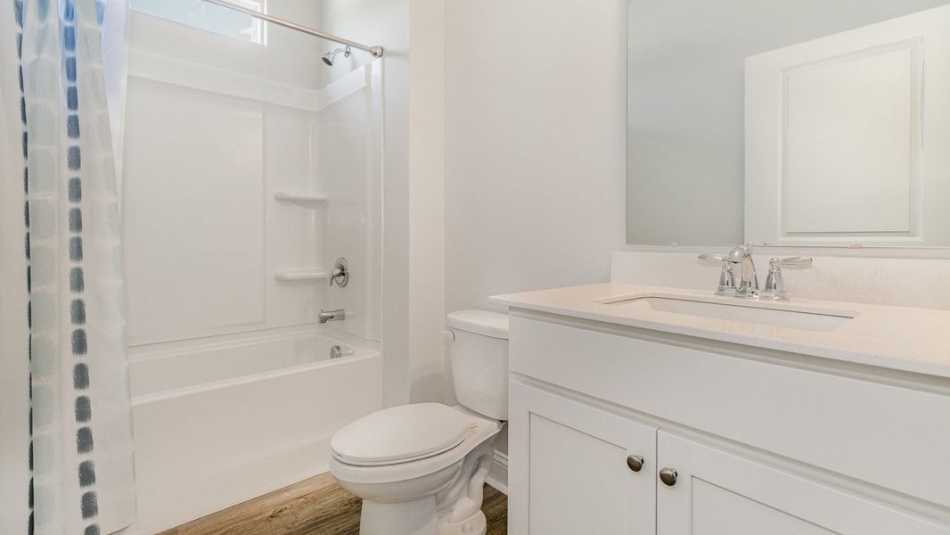 Furnished interior view inside a new home in Coastal Farms, Conway (Image 11).